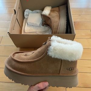 Brand new Uggs! Never been worn before, they were a little too big for me.